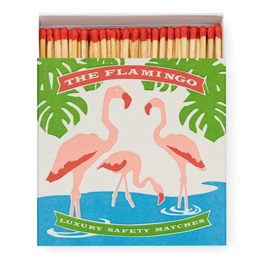 Red tipped wooden safety matches popping out of the flamingo match box