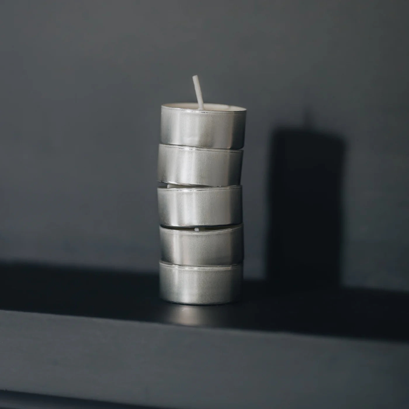 Frankincense & myrrh soy wax tea light candles stacked on top of each other