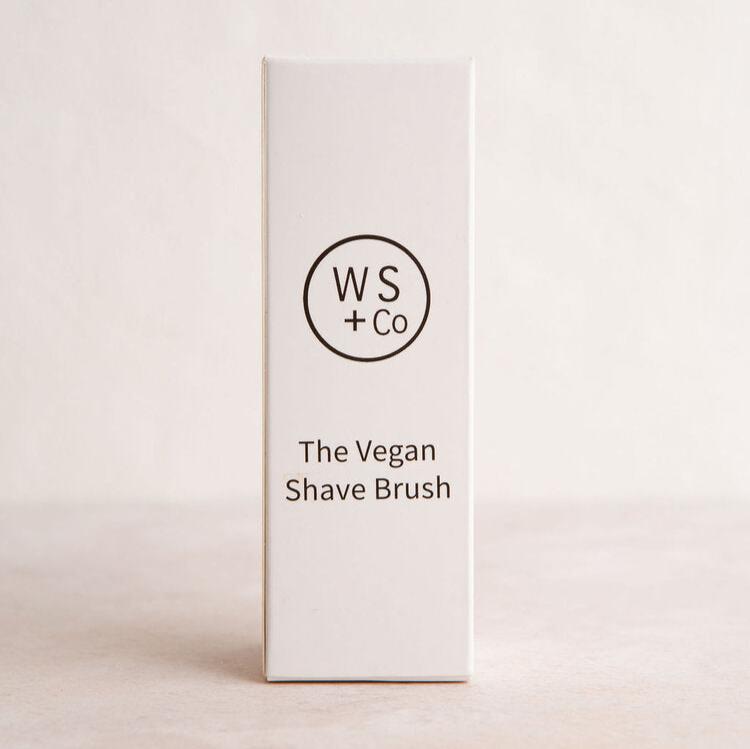 The vegan wooden shaving brush in box on table