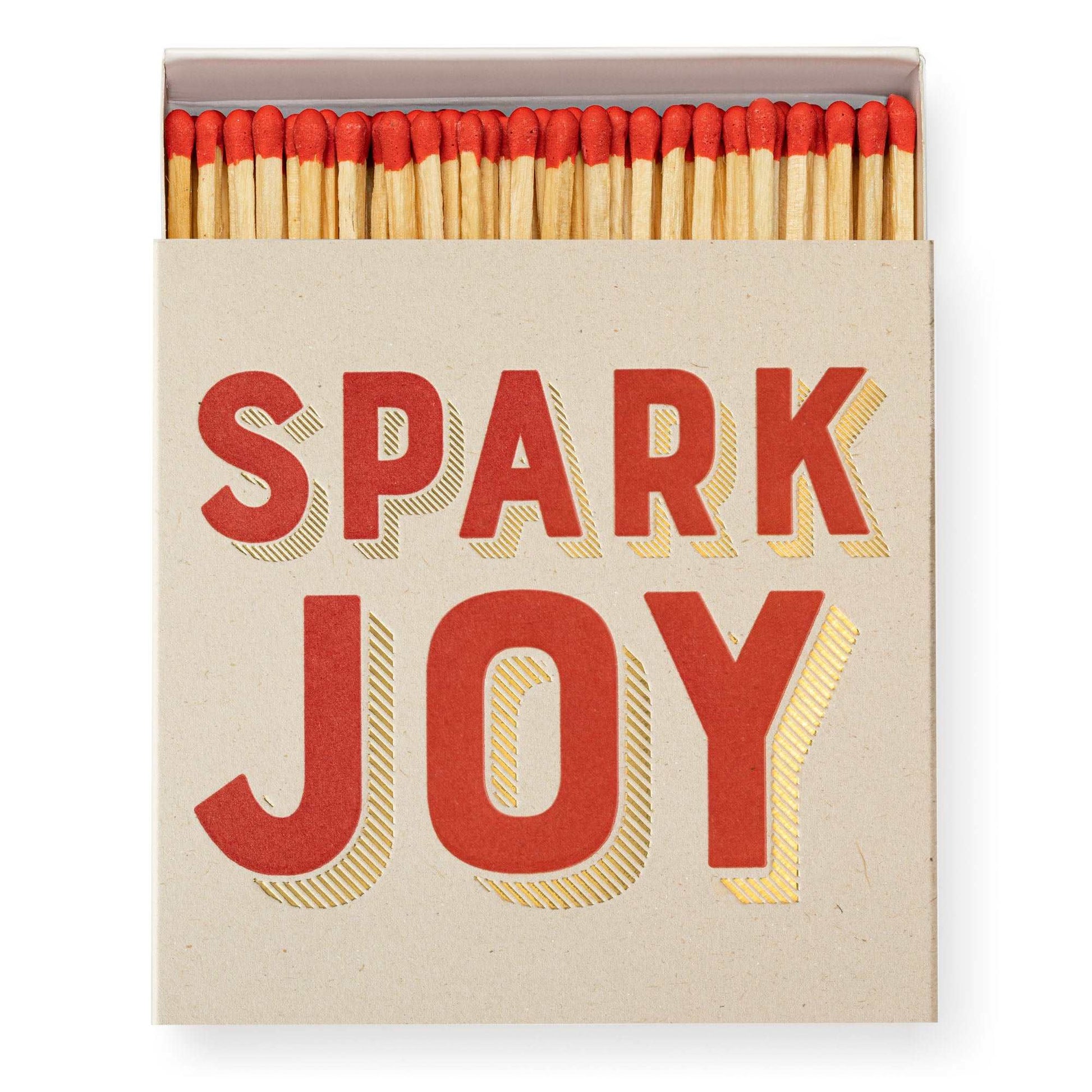 Red tipped wooden safety matches popping out of the spark joy match box