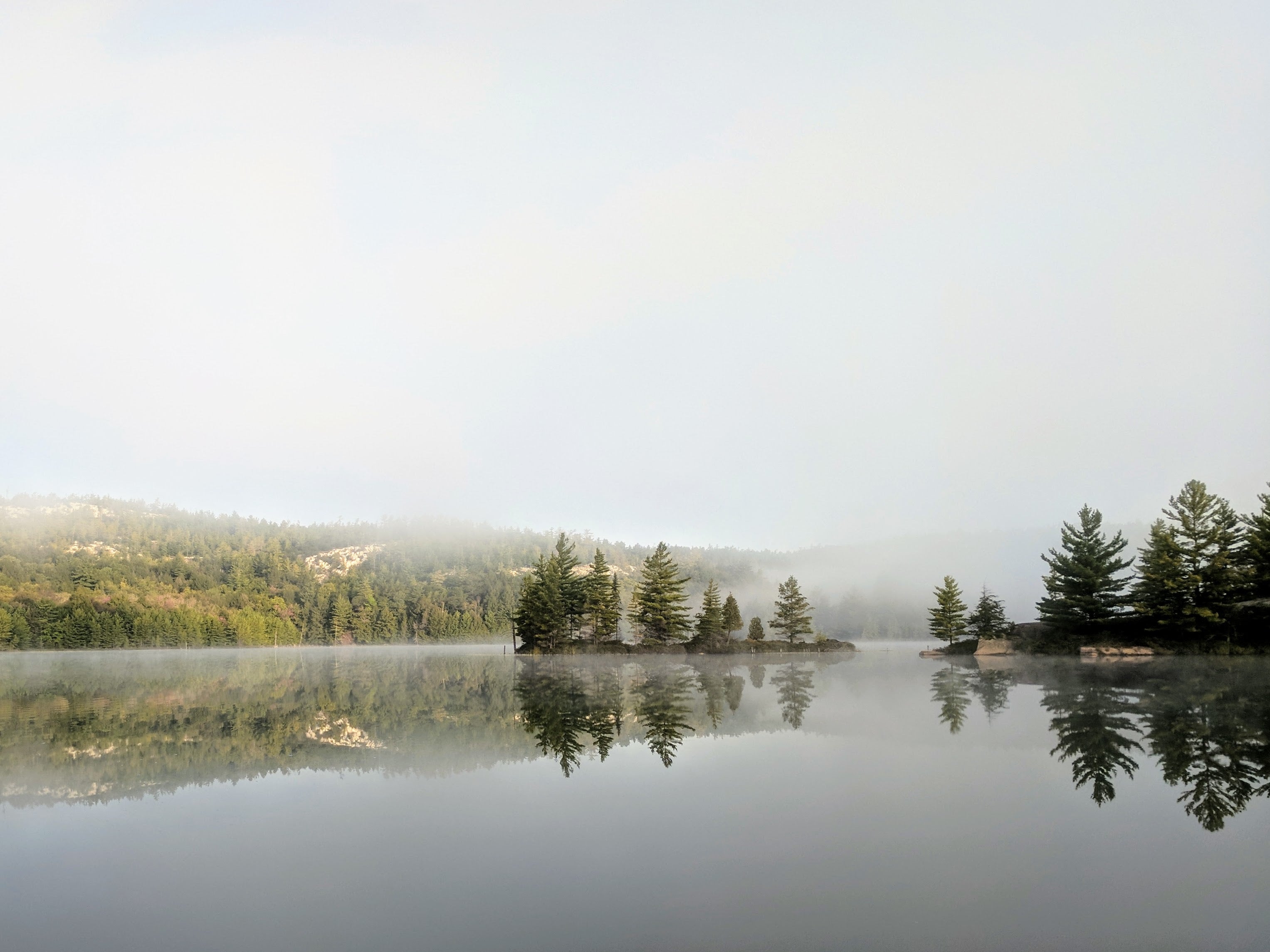 Cleaning page showing a view of a calm lake in Scandinavia